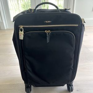 Tumi voyageur super leger black international carry on with gold hardware